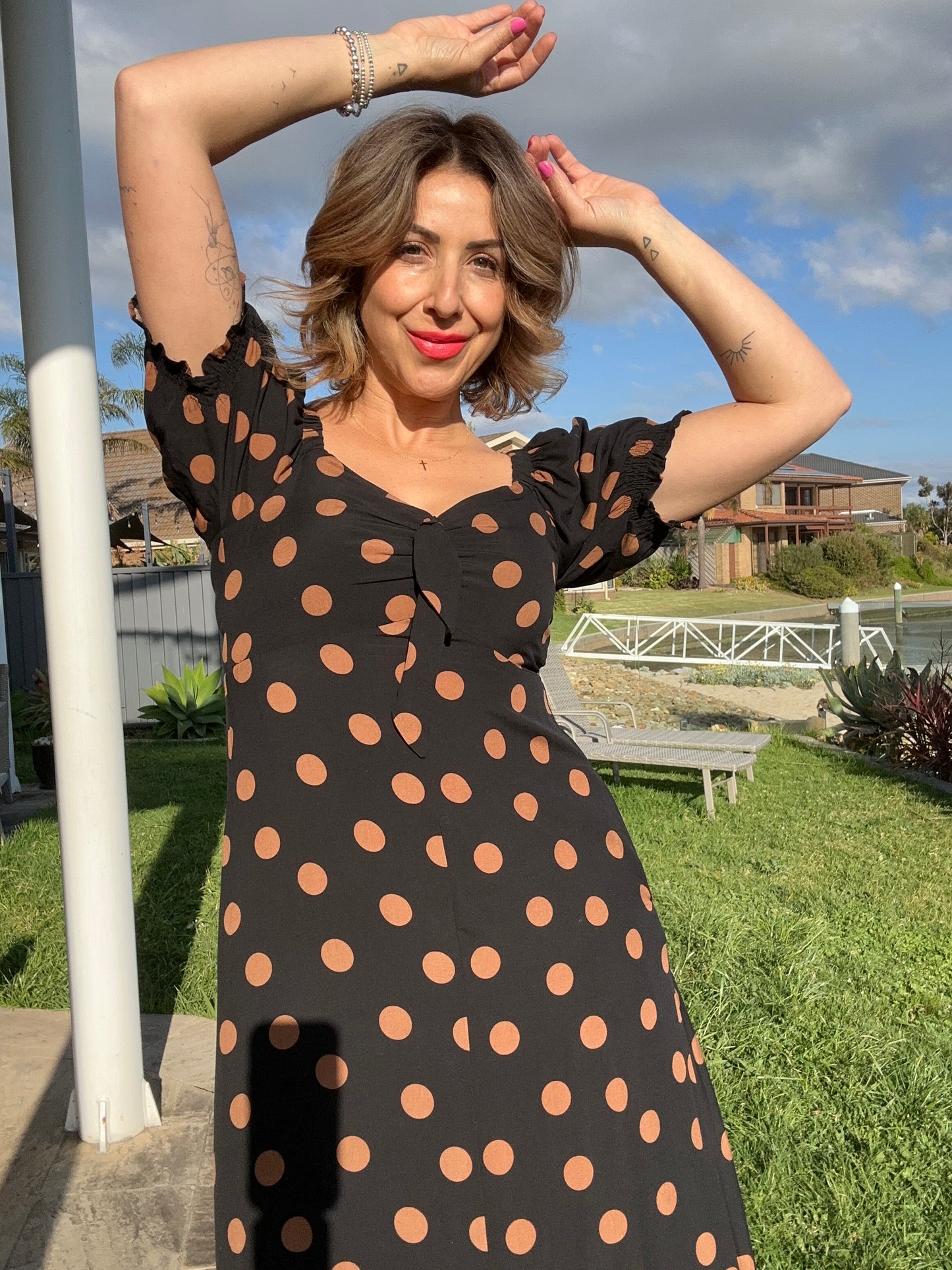 MEGHAN - BLACK w TAN SPOTS bow front midi dress