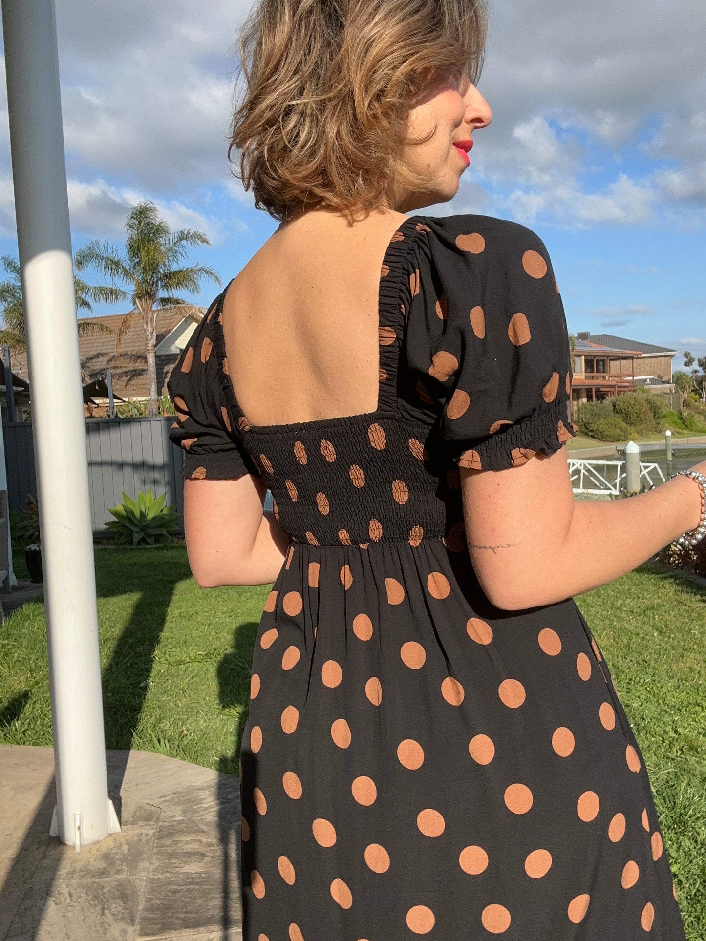 MEGHAN - BLACK w TAN SPOTS bow front midi dress